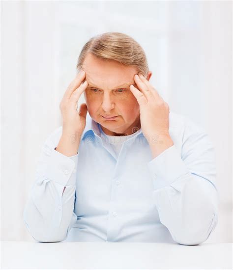 Stressed Old Man Holding Head At Home Stock Image Image Of Conflict