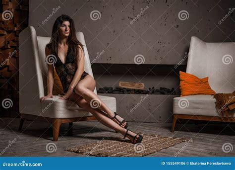 Beautiful Woman In Lingerie Sitting In A Chair Stock Photo Image Of Glamour Fetish