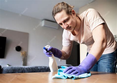 premium photo man servant doing chores around the house