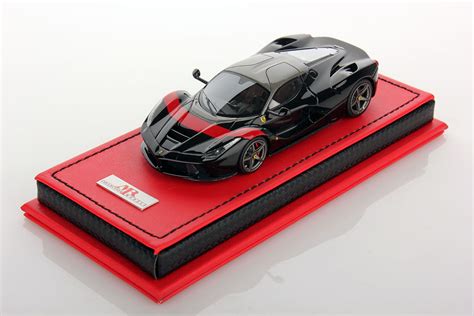 The 1:2 scale reproduction of the official hp77 helmet, worn by charles leclerc during the 2021 formula 1 season. Ferrari LaFerrari 1:43 | MR Collection Models