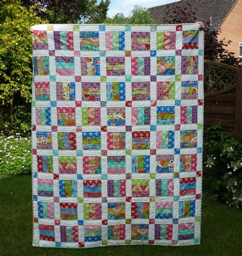 30 Jelly Roll Quilt Patterns And Designs The Funky Stitch