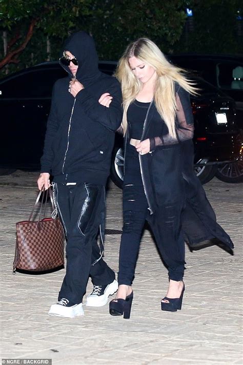Avril Lavigne Flashes Midriff As She And Mod Sun Twin In Black On Date Night In Malibu Express