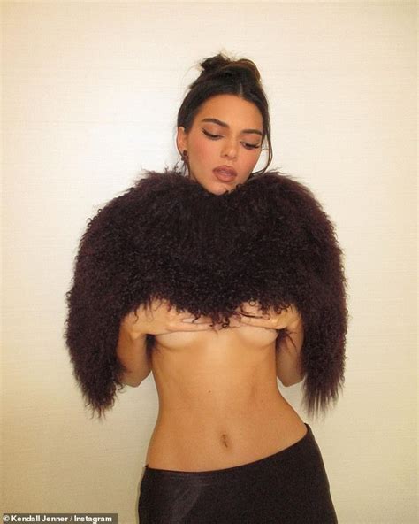 Kendall Jenner Flashes A Glimpse Of Underboob And Bare Taut Midriff In