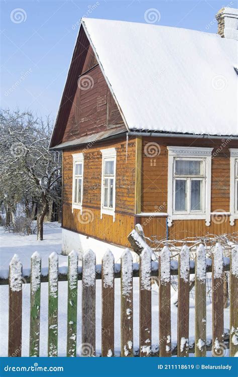 Vintage Wooden Rural House In Belarus Ornamental Windows With Carved