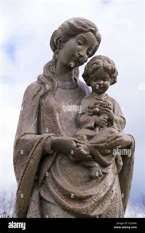 Statue Of Virgin Mary Holding Baby Jesus Outside Our Lady Of The Snows Catholic Church