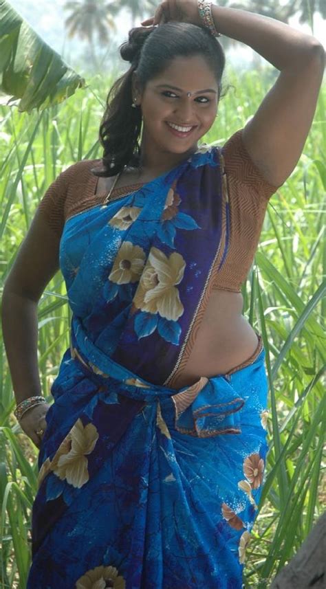 Sexclusive Stills Nagalakshmi Exposing In Blue Colour Saree