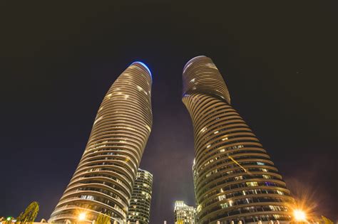 Free Curvy Condo Towers At Night Image Stunning Photography