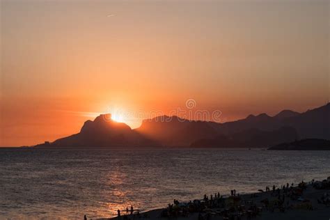 Orange Sunset By The Ocean In Piratininga Niteroi With Sun Dipping