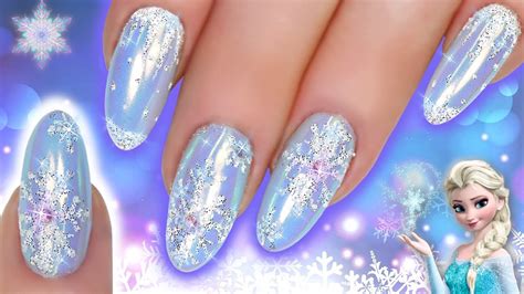 snowflake nail art elsa frozen glitter chrome blue nails ultimate bling christmas nail