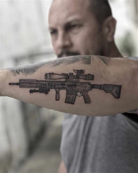 Of The Best Gun Tattoos Tattoo Insider