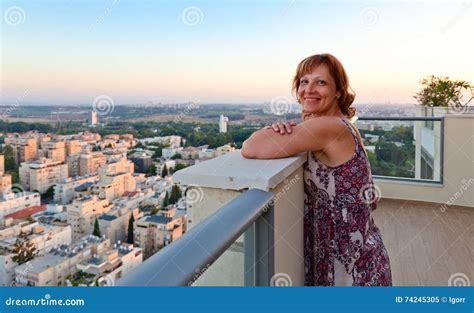 Woman On A Balcony In Downtown Stock Image Image Of Modern Perspective