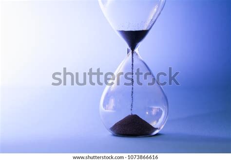 Sand Running Through Hourglass Measuring Passing Stock Photo 1073866616