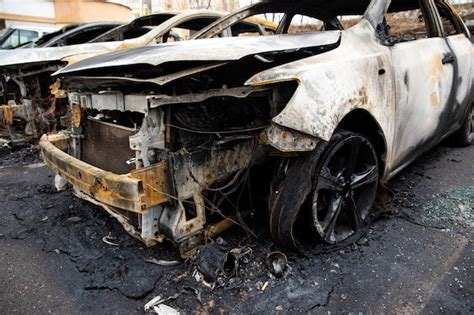 Premium Photo Broken And Burnt Cars In The Parking Lot Accident Or