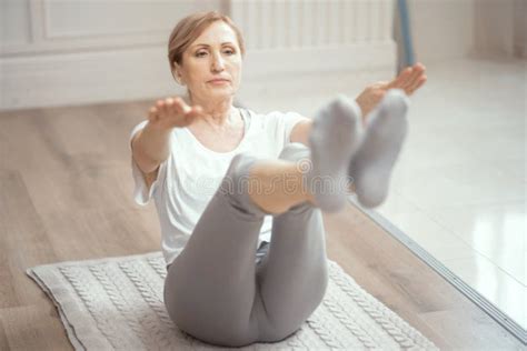 Cheerful Mature Woman Making Yoga Exercises Stock Image Image Of Room