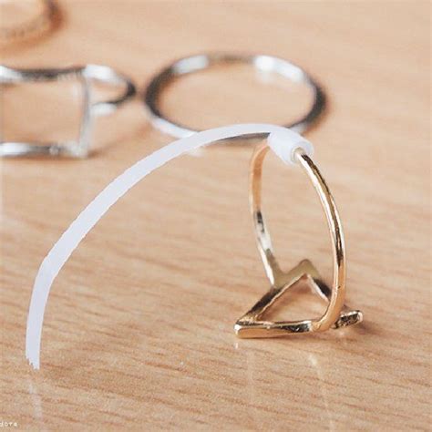 To make a ring smaller, jewelers typically: Rings too big? Re-sizing large rings with just using tape! | How to make rings, Diy rings, Make ...