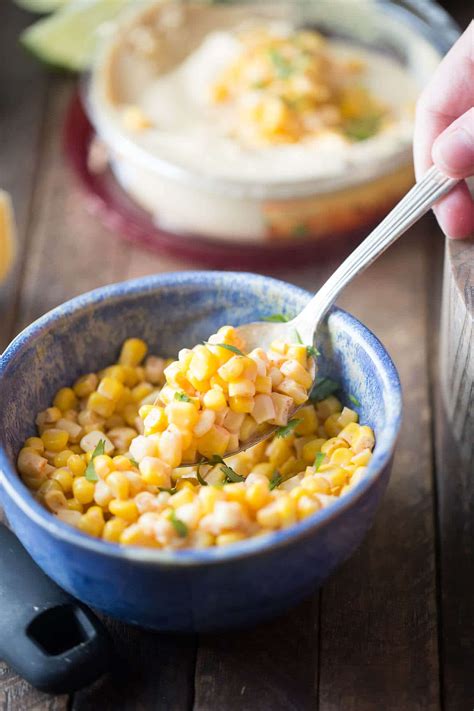 The perfect corn on the cob recipe for this summer! Mexican Street Corn Salsa Hummus - LemonsforLulu.com