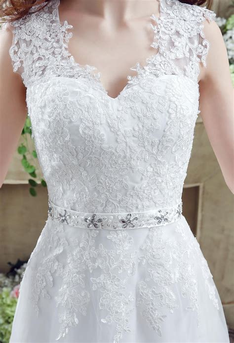 Modest A Line V Neck Full Back Tulle Lace Applique Wedding Dress With Crystals Sash