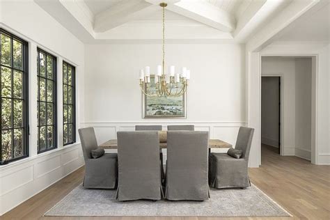 Benjamin Moore Dove Wing Dining Room Featuring Wainscoting And X Beam