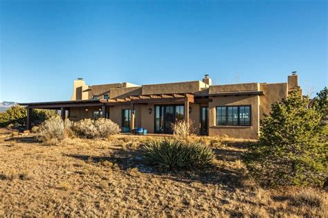 Pueblo Style Home Fits Perfectly Into The New Mexico Landscape