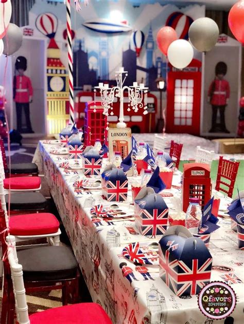 A Long Table With Red White And Blue Decorations Is Set Up For A Party