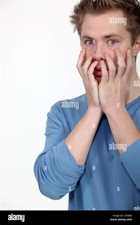 Shocked Man On White Background Stock Photo Alamy