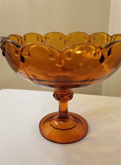 Vintage Amber Pressed Glass Pedestal Candy Dish Etsy Colored Glassware Candy Dishes Amber