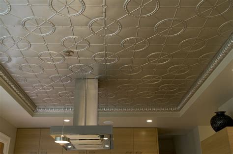 Thinking about an ornate tin ceiling? A remodeled kitchen artfully blends old and new ...