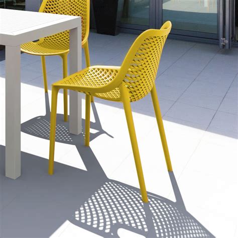 Yellow kitchen chairs daisy in yellow doodles by cheeky chairs. Compamia : Air Outdoor Dining Chair Yellow ISP014-YEL