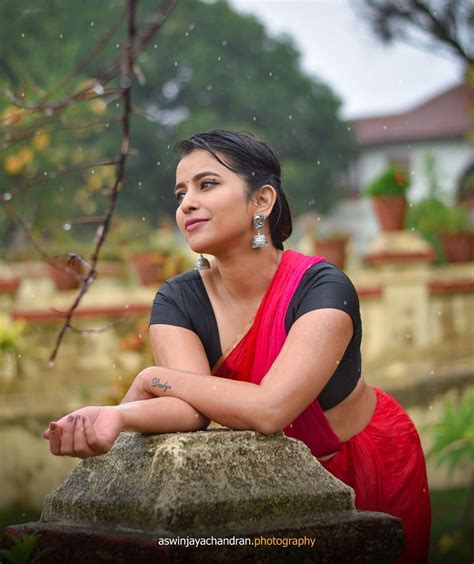 komalee prasad hot wet saree photos in rain south indian actress