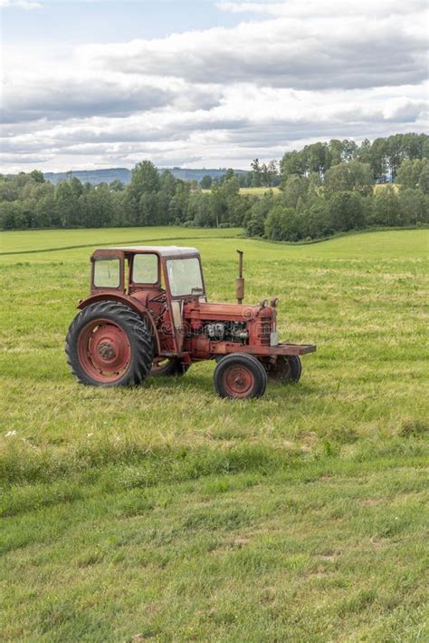 Red Tractor In Farming Landscape Stock Photo Image Of Tractor Field