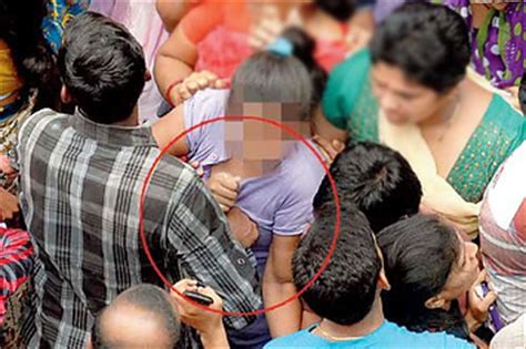 Shocking Photographs Of Three Perverts Molesting A Woman During A Religious Festival In Mumbai