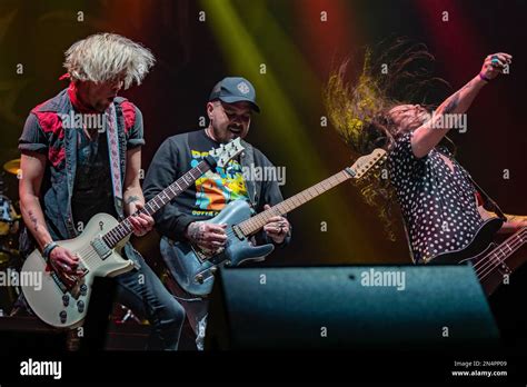 l r ben wells chris robertson and steve jewell of band black stone cherry playing live on stage
