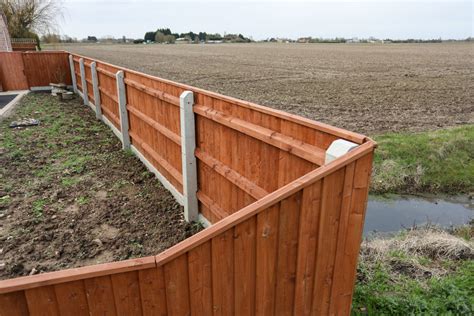 How To Install Concrete Fence Posts And Gravel Boards For A Panel Fence