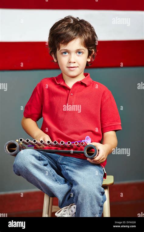 Boy Playing Xylophone In Music Class In Elementary School Stock Photo