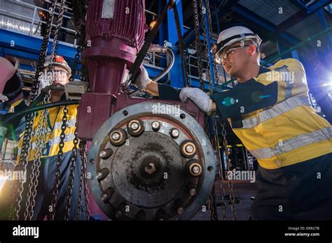 Workers Doing Maintenance Work At Power Plant Stock Photo Alamy