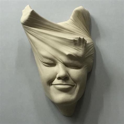 surreal ceramic sculpture captures the carefree bliss of falling in love sculpture sculpture