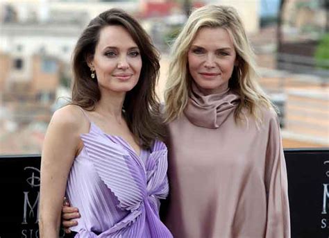 Angelina Jolie And Michelle Pfeiffer Attend Maleficent Photocall In