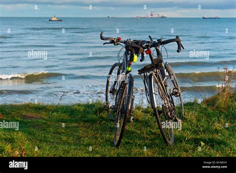 Two Bikes On The Beach Two Bikes On The Coast Stock Photo Alamy