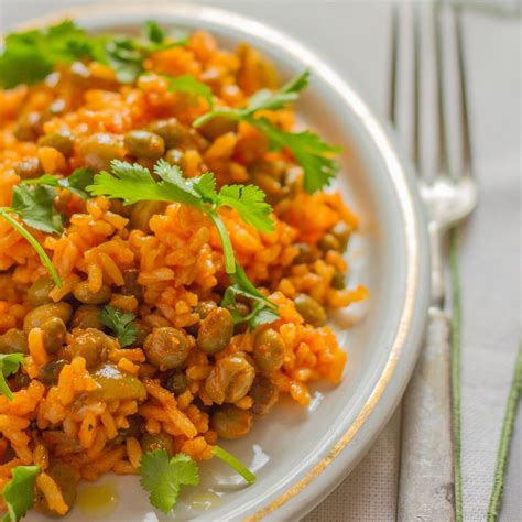 Arroz Con Gandules Puerto Rican Rice With Peas Recipe Emily Farris Food And Wine
