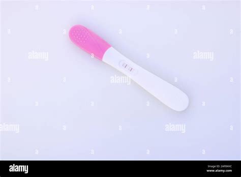 Pregnancy Test Showing A Positive Result Isolate On White Background