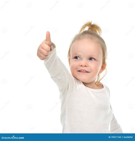 Child Baby Girl Happy Looking Up Smiling With Hand Thumb Up Sign Stock