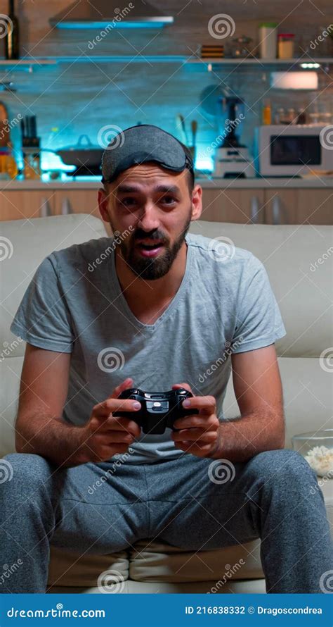 Upset Pro Gamer Sitting In Front Of Television Losing Soccer Video