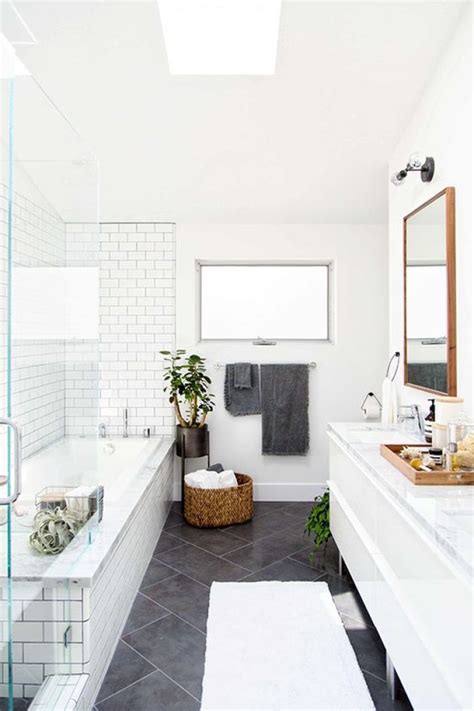 Place a simple vanity in warm wood tones against a honeycomb of blue and white small wall tiles for an unexpected touch of charm to. Minimalist Bathroom Inspiration - The Beautydojo