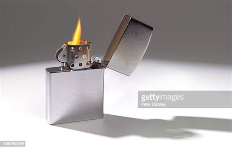 Lit Lighter Photos And Premium High Res Pictures Getty Images