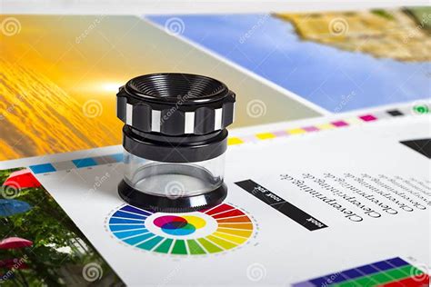 Print Loupe On Offset Printed Sheet With Basic Colors Stock Image