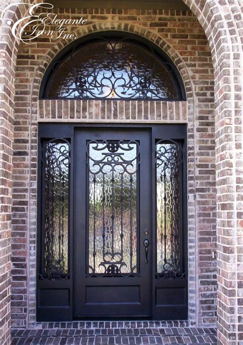Custom Wrought Iron Door With Sidelights And A Full Arch Transom