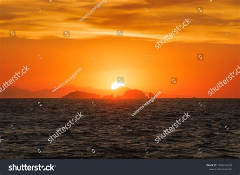 Watching Golden Sunset Sun Hiding Behind Stock Photo 1893412630