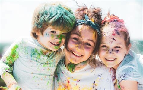 Premium Photo Kids Celebrate Holi With Color Happy Holi Portrait Of A