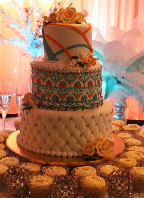 Wedding Cake With Teal And Orange Accents