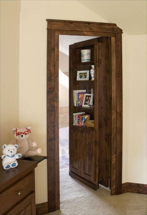 Throughout the history of mankind, we've been fascinated with hidden. Custom wooden secret bookcase door | StashVault